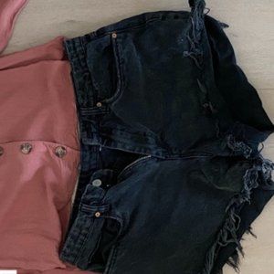 Black shorts with  pink shirt